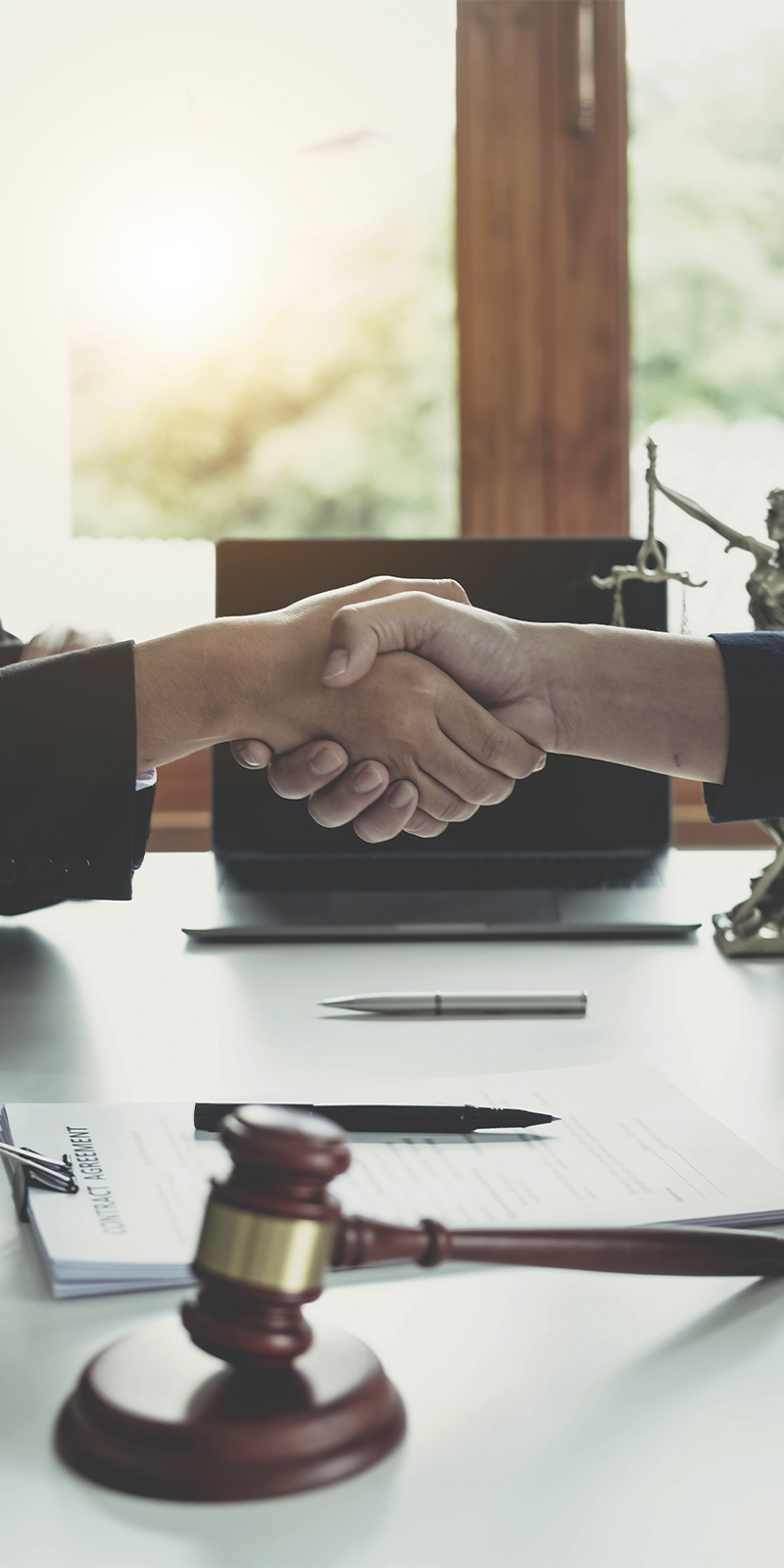 businessman-shaking-hands-seal-deal-with-his-partner-lawyers-attorneys-discussing-contract-agreementxa