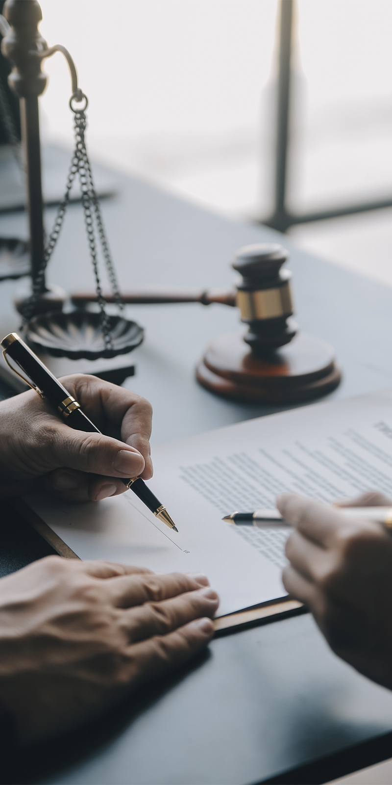 justice-law-conceptmale-judge-courtroom-with-gavel-working-with-computer-docking-keyboard-eyeglasses-table-morning-light