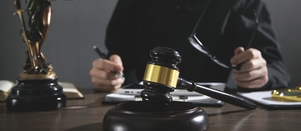 male-judge-working-courtroom
